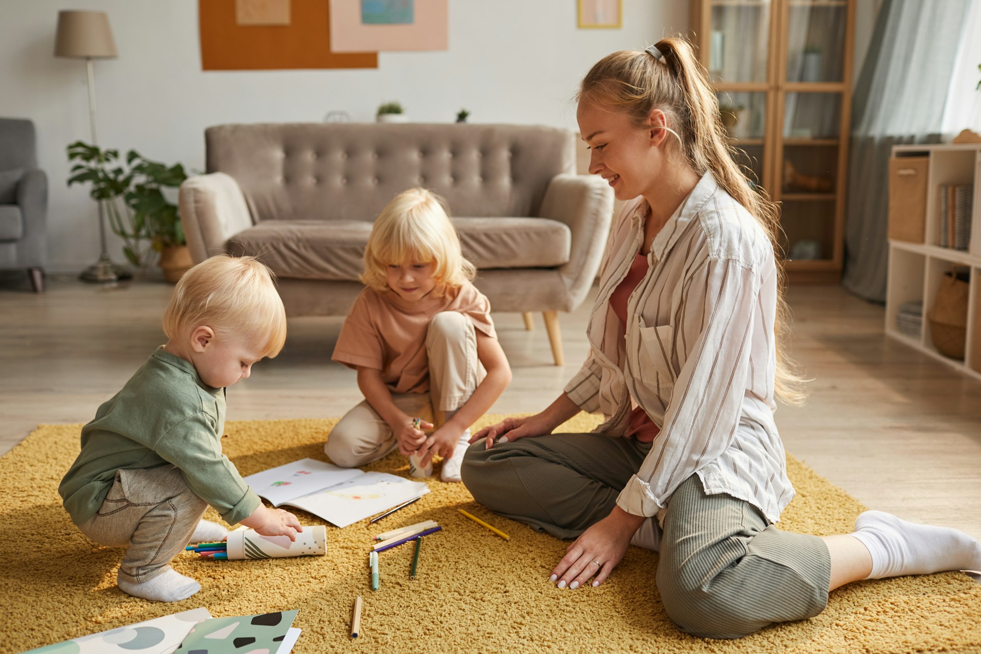 Mother playing with children
